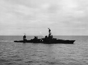 Torpedoed cruiser USS Chicago (CA-29) low in the water on 30 January 1943.jpg