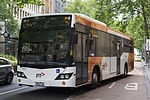 Transdev Melbourne number 972 (8253AO) Custom Coaches bodied Scania in PTV livery on route 250 in Queen St, December 2013.jpg