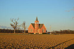 Fields and the former Grace United Methodist Church