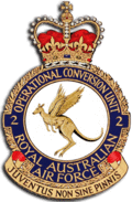 Crest of 2 Operational Conversion Unit, Royal Australian Air Force, featuring a winged kangaroo and the motto "Juventus Non Sine Pinnis"