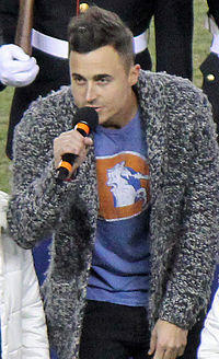 King performing the National Anthem at Sports Authority Field at Mile High in December 2013