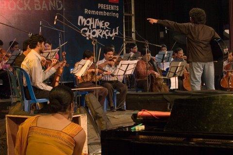 Anubrata Ghatak conducting the orchestra