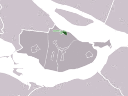 The village centre (darkgreen) and the statistical district (lightgreen) of Den Bommel in the former municipality of Oostflakkee.