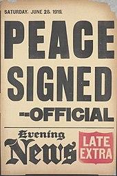 An off white poster with bold black letters.