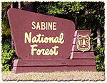 A sign for Sabine National Forest.