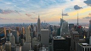 New York, described as the cultural,[1][2][3][4] financial,[5][6][7] diplomatic, and media capital[8][9] of the world.[10][11] Manhattan (above), functions as the financial and cultural core of the entire New York metropolitan area.