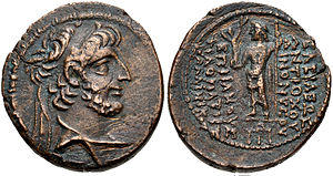 A coin of king Antiochus XII. On its reverse, the Greek god Zeus is depicted, while the obverse have the king's bust
