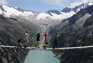 A simple suspension footbridge in the Zillertal Alps
