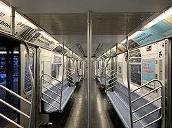 The empty interior of a newer R142A car on the 5 train