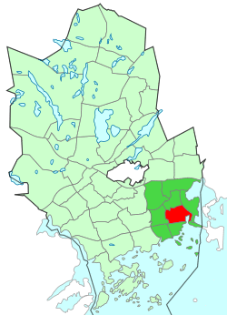 Location of Tapiola (red) within Espoo (light green) and Suur-Tapiola (dark green)