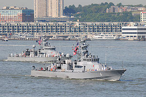 US Navy 100526-N-5244H-002 The Cyclone-class coastal patrol ships USS Tempest (PC 2), left, and USS Monsoon (PC 4) make their way down the Hudson River en route to Fleet Week New York 2010.jpg