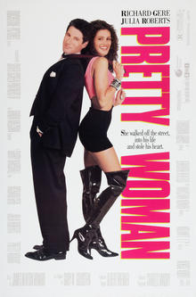 A man in a black smart suit stands back to back with a woman wearing a black short skirt and black thigh-high boots.