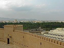 View of the city from Rustaq Fort, with the Western Hajar Mountains in the background