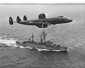 Lockheed WV-2 of VW-15 flies over USS Sellstrom (DER-255) off Newfoundland, in March 1957.jpg