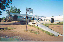 Sudan Rumbek aircraft beside airstrip 2004.jpg