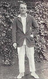 A cricketer wearing a blazer