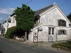Namakokabe-style house typical of Matsuzaki