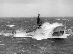 HMS SCORPION, Weapon Class destroyer, lifts her nose out of the water while operating in heavy Northern waters during Exercise Mariner, September 1953 (IWM A 32750)