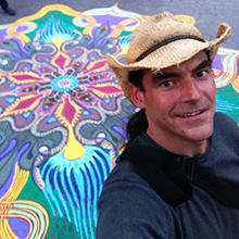 Joe Mangrum in front of sand painting at Union Square.jpg