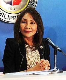 Gwendolyn Garcia at a press briefing.jpg
