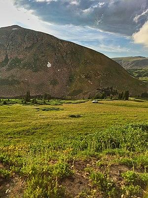 Illegal off-roading of a vehicle on Rollins Pass near Mount Epworth and Deadman's Lake. The alpine tundra is extremely fragile and can take 100–500 years to fully recover.[228][229]