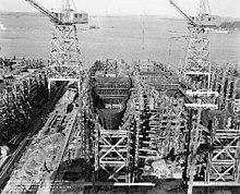 Buckley class destroyer escorts under construction at the Bethlehem Hingham Shipyard, Massachusetts (USA), on 20 January 1943 (BS 85616).jpg