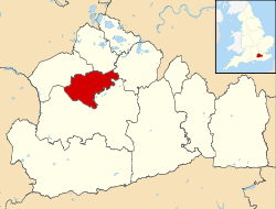 Woking shown within Surrey