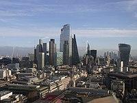 The City of London skyline as viewed from St Paul's Cathedral, December, 2019. The tallest building shown here is 22 Bishopsgate at 278m, which topped out in 2019. Since its construction the famous "Gherkin" building is no longer visible from this angle. There are currently three towers in this cluster that are above 200m tall with three more approved to be constructed at 204m, 249m and 290m by 2026. Also shown in the far distance on the left is the emerging cluster in Stratford
