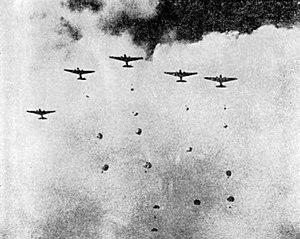 Japanese Paratroopers Dropping Over Langoan Airfield, Manado, 1942.jpg