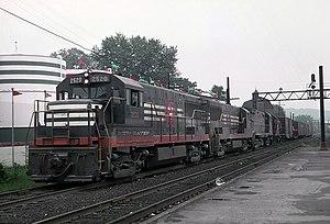 New Haven 2520 (U25B) going through Danbury, CT on Matbrook freight line, July 28, 1968 (22366087578).jpg