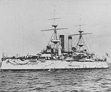 Black and white image of a white-painted warship
