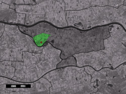 The village centre (red) and the statistical district (light green) of Poederoijen in the municipality of Zaltbommel.