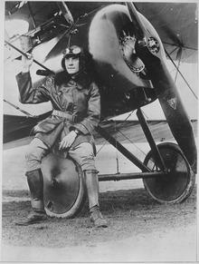 Lieutenant Earl Carroll, prominent composer, is now a full-fledged aviator in the U.S. Service. He is shown beside... - NARA - 533718.tif
