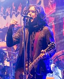 Martin performing in 2015