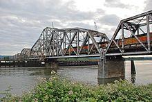 BNSF 9.6 railroad bridge, train crossing swing span.jpg