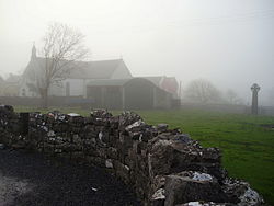 St. Fachtna's Catholic church and the "West Cross" in the mist