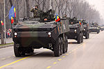 Romanian Piranha IIIC APCs during the Romanian National Day military parade.jpg