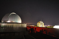 Observatory built in 2009 on top of the SER building as seen at night.