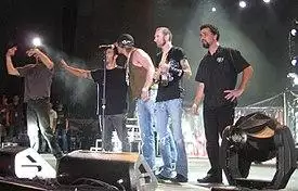 Godsmack with illusionist Criss Angel in 2007. From left to right: Robbie Merrill, Sully Erna, Angel, Shannon Larkin, Tony Rombola