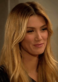 Delta Goodrem as Nina Tucker (2015).png