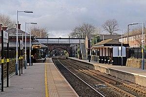 Along the platform, Rainhill railway station (geograph 3819320).jpg