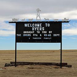 A welcome sign in Byers.