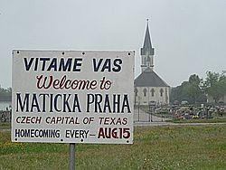 Welcome sign of Praha, Texas.