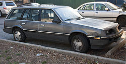 1987 Pontiac Sunbird Safari hf.jpg