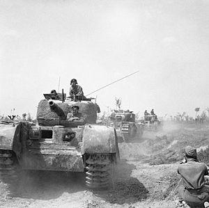 Churchill tanks being filmed by an AFPU cameraman during the advance of 56th Division north-east of Argenta, Italy, 17 April 1945. NA24288.jpg