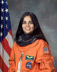 Kalpana Chawla, NASA photo portrait in orange suit.jpg