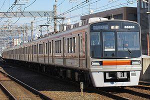 Osaka Subway 66603 at Ibaraki-shi Station.JPG
