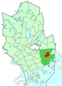 Location of Pohjois-Tapiola (red) within Espoo (light green) and Suur-Tapiola (dark green)