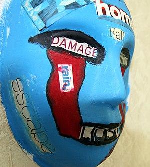 A mask, painted by a Marine who attends art therapy to relieve post-traumatic stress disorder symptoms, USMC-120503-M-9426J-001.jpg