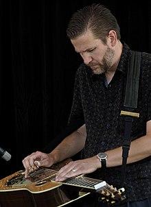 Performing with his band, Blue Highway. June 21, 2010